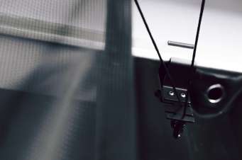 G-trak attachment to garage door tracks
